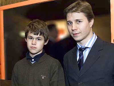 Magnus Carlsen  y Alexander Motylev