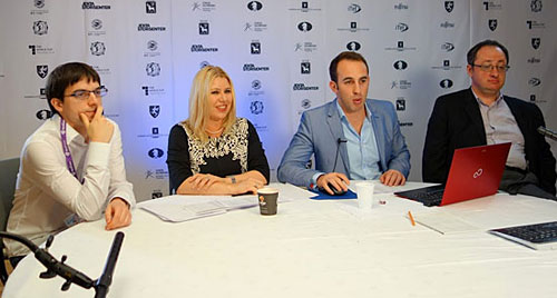 R 4 El vencedor, Vachier-Lagrave, Susan Polgar, Lawrence Trent y Gelfand en el post mortem
