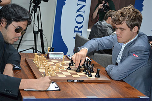R 5 Otra vez gafas oscuras de Nakamura ante Carlsen, que juega la Berlinesa